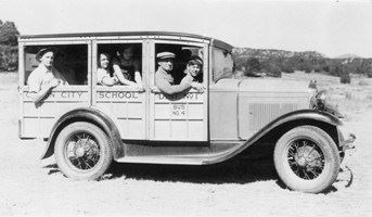 Black and white image of Kessler with his students in a 1930s car. Circa 1932.