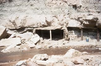 Color photo of Cleveland-Delfs Quarry located near a creek.